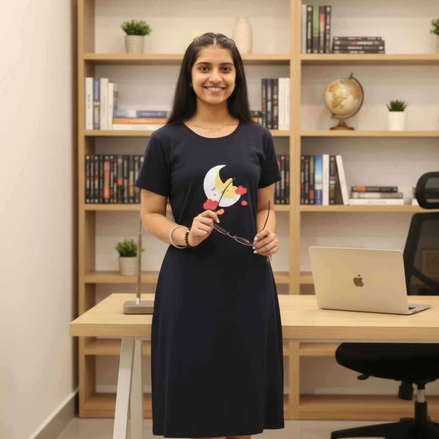 women wearing a dark blue cotton short nighty with graphic design on chest area