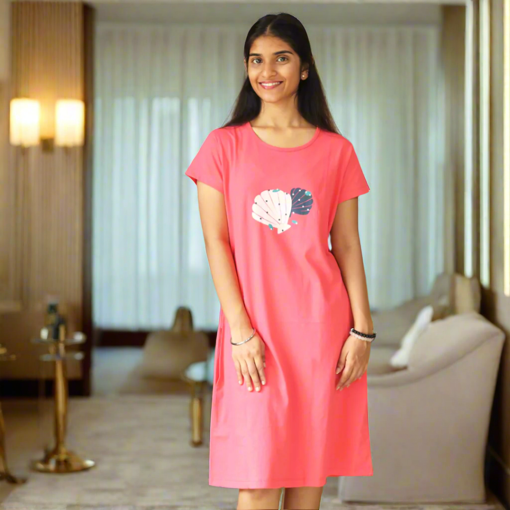 coral color cotton knee length short nighty with floral print on the chest area