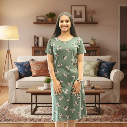 Women wearing a mehendi green color cotton short nighty with prints all over