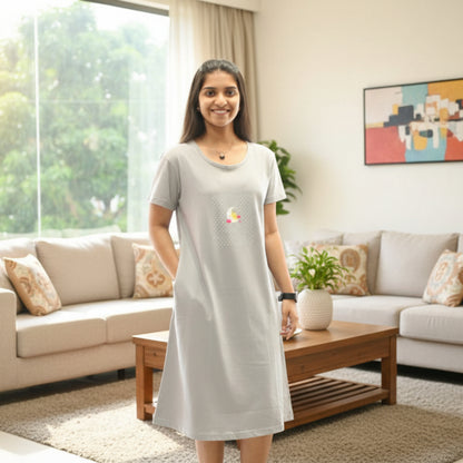 women wearing cotton knee length short nighty with hands in pocket, moon design in chest area 