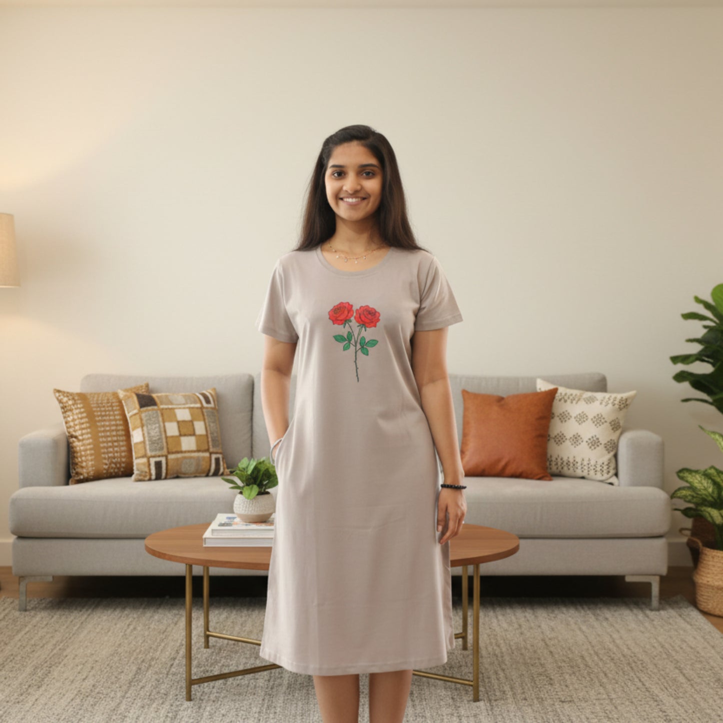 women wearing a light grey color cotton short nighty with floral design
