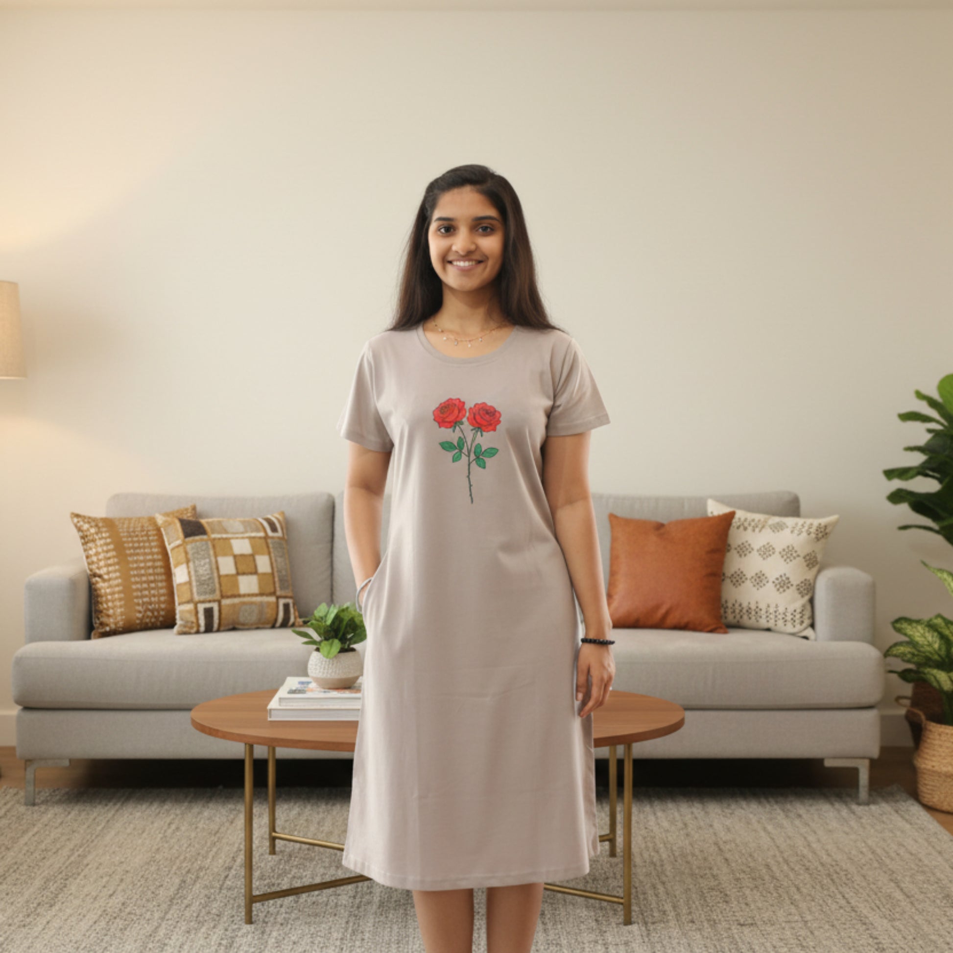 women wearing a light grey color cotton short nighty with floral design