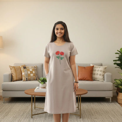 women wearing a light grey color cotton short nighty with floral design