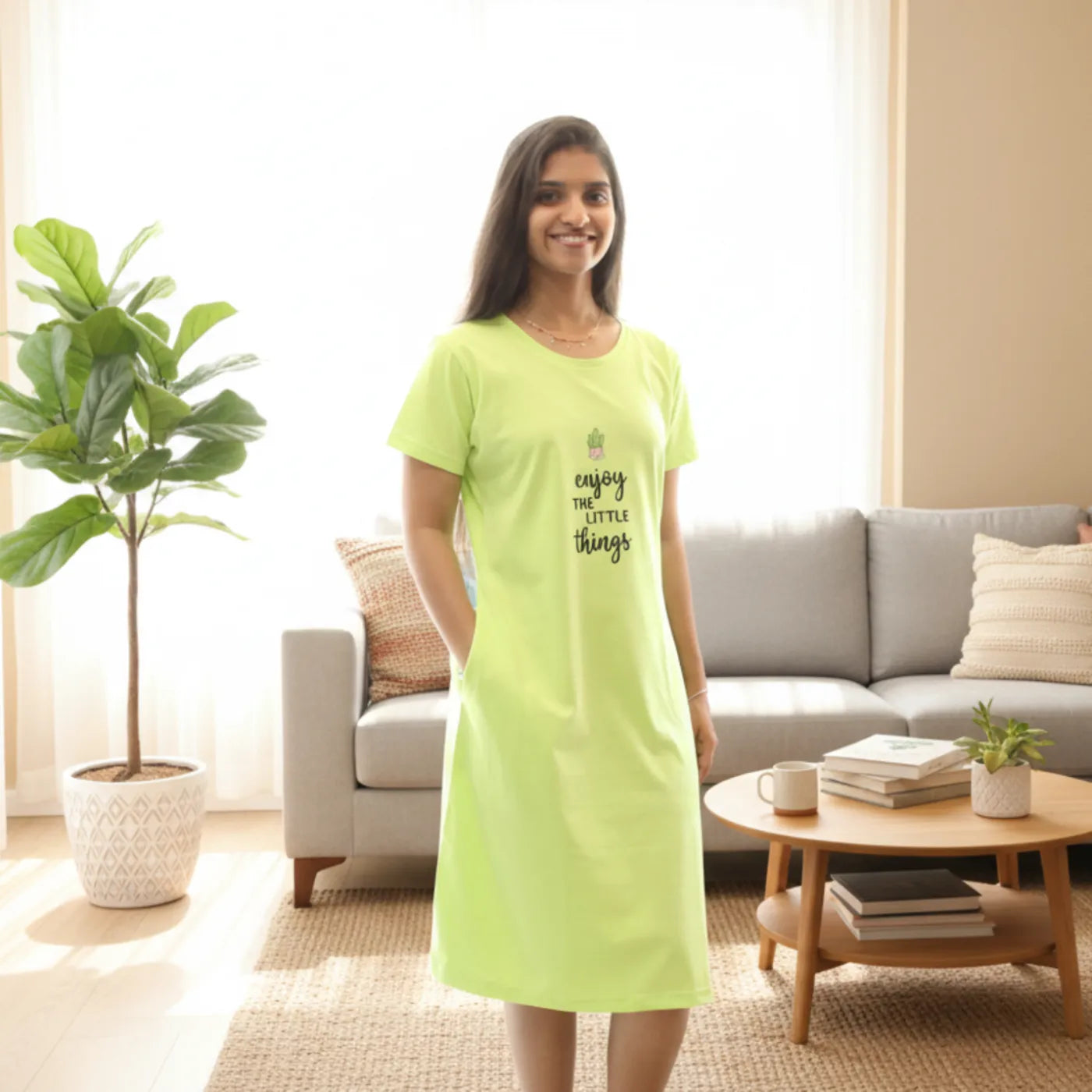women wearing parrot green cotton short nighty with hands in pocket, print in chest area