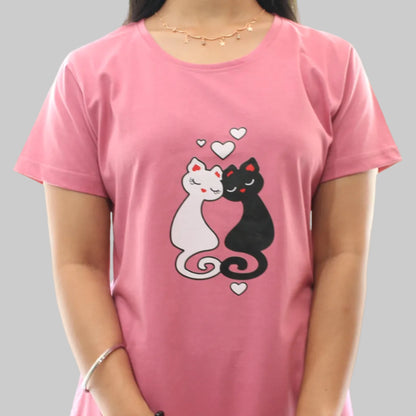 women wearing a pink short nighty  with cat design on a white background