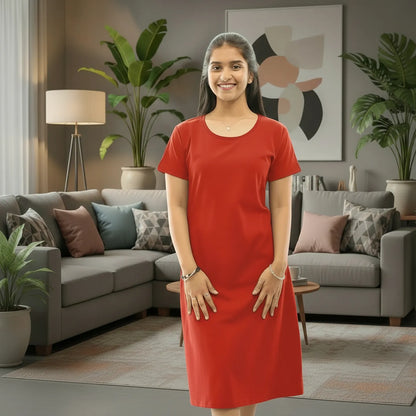 women wearing a red plain color t-shirt dress standing in a living room