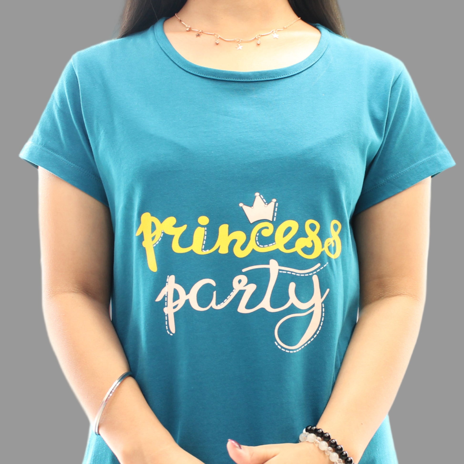 close up view of chest print in teal color short nighty