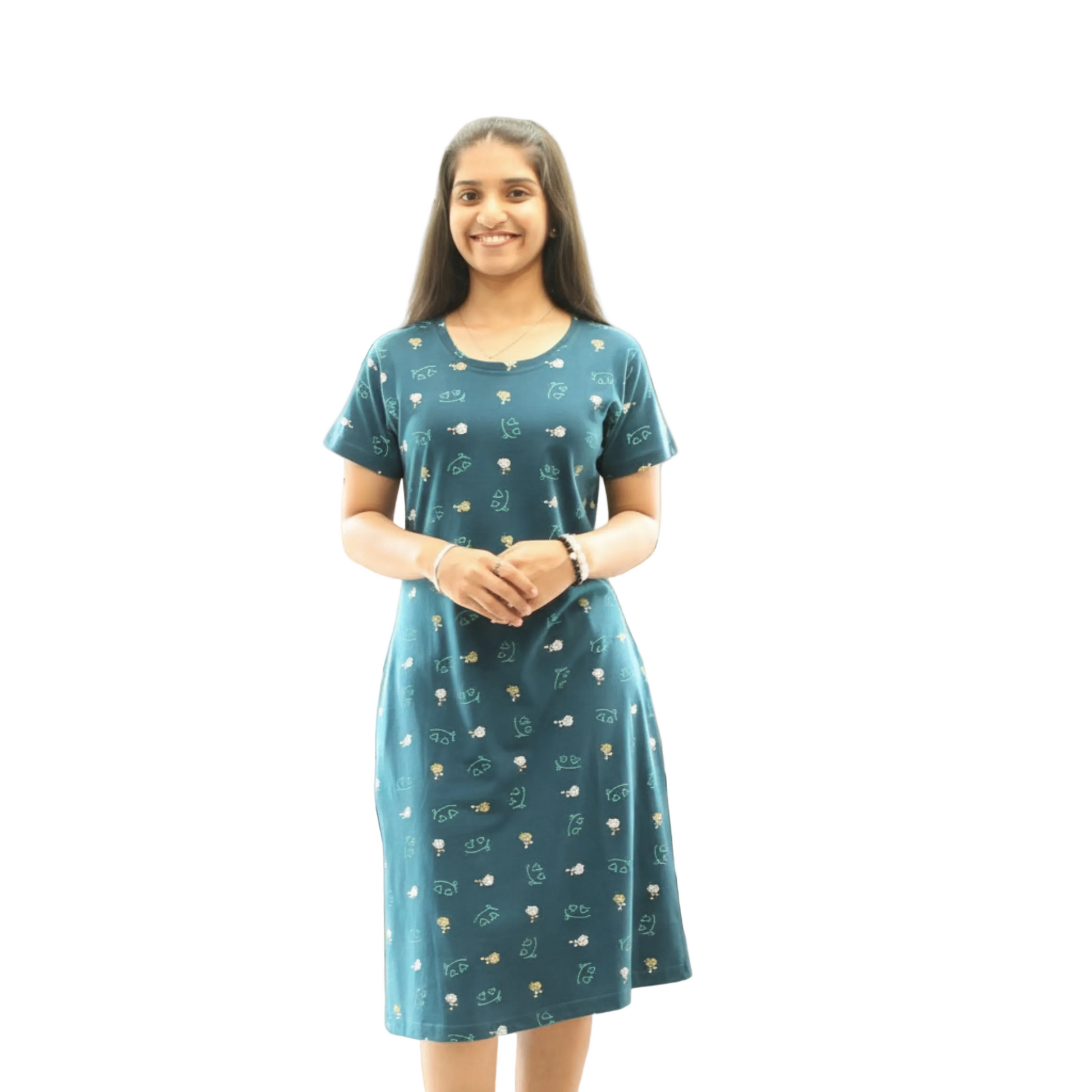 Woman wearing a teal color cotton short nighty dress with all over print design.