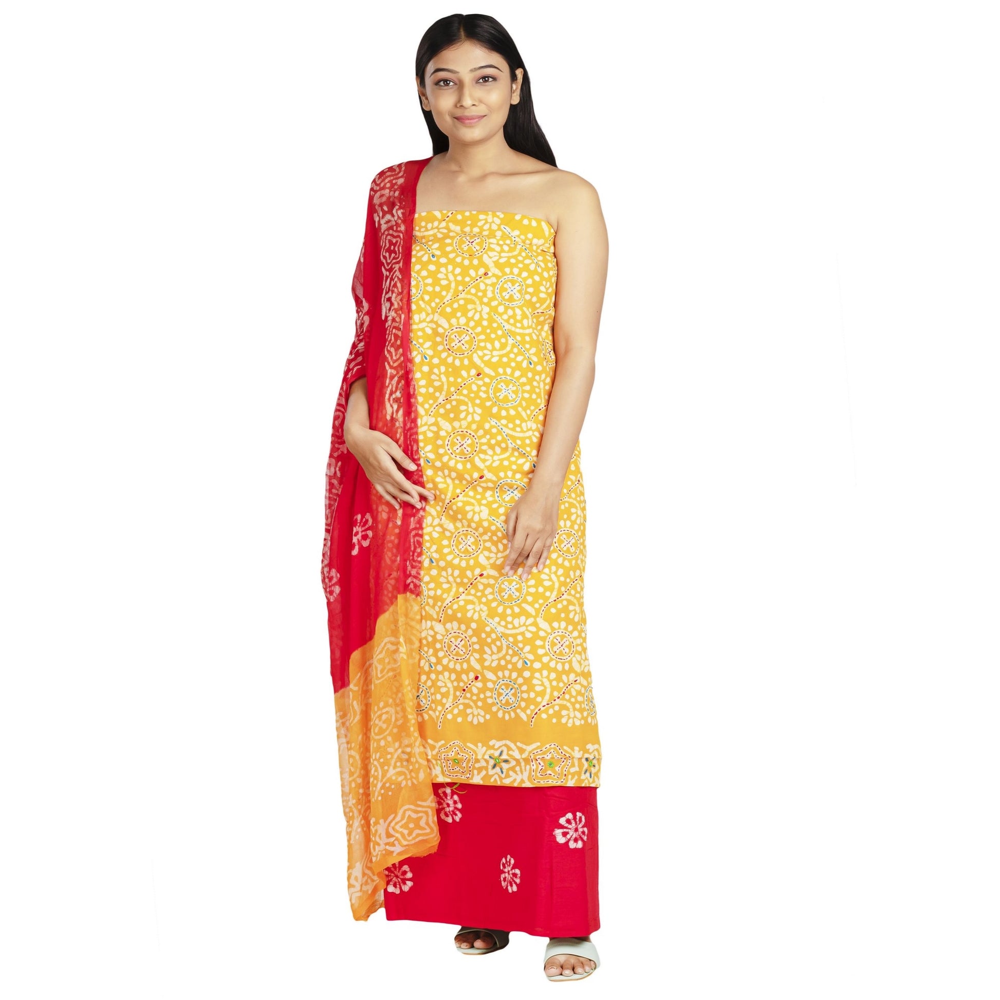 yellow cotton top with embroidery and white print , red bottom with white print, chiffon dupatta in red and yellow