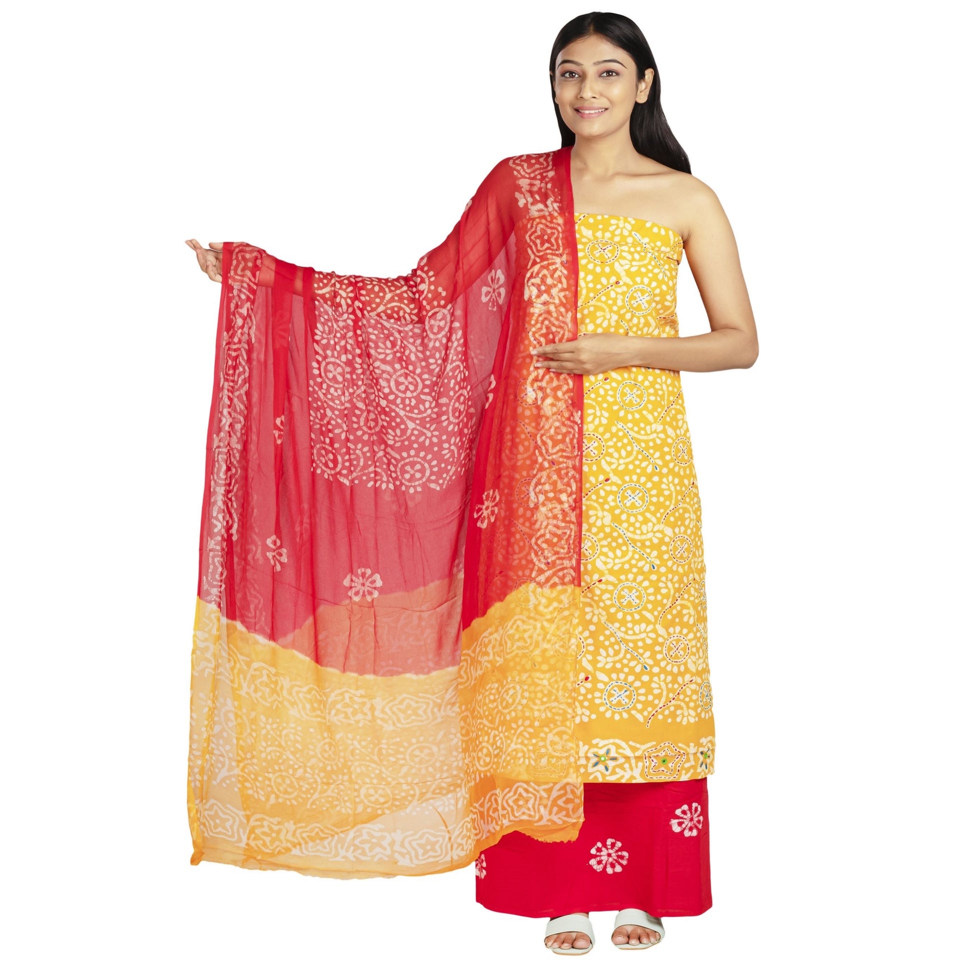 yellow cotton top with embroidery and white print , red bottom with white print, chiffon dupatta in red and yellow