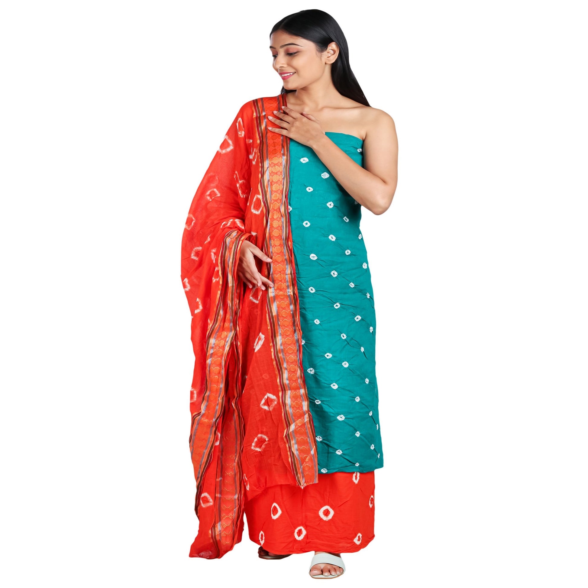 Teal cotton bandhani dress material orange bottom and dupatta all with white bandhej prints, dupatta has golden border