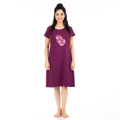 purple cotton short nighty with pink feather print on chest, round neck and short sleeve, knee length gown